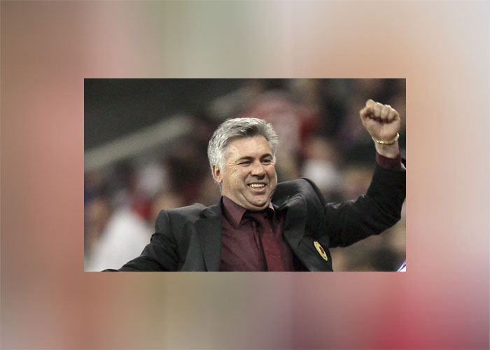 Carlo Ancelotti happy. 