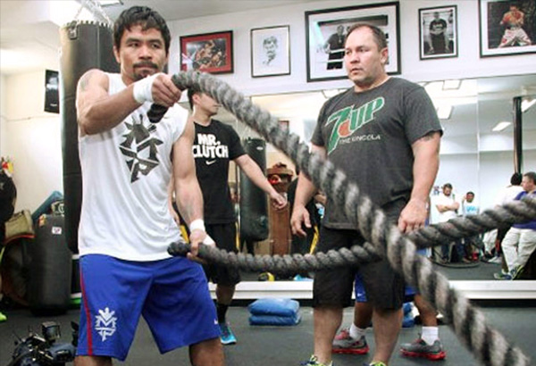 Manny Pacquiao and coach Justin Fortune. 