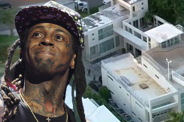 Rapper Lil Wayne's mansion raided by police. 