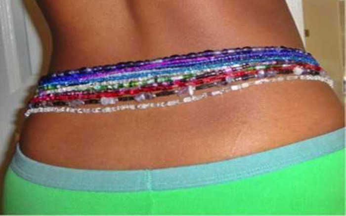 African women and waist beads. 
