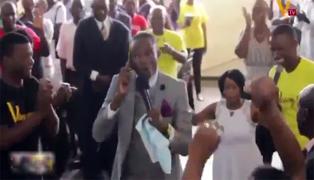 Zimbabwean pastor Sanyangore calls and speaks to God on phone. 