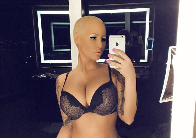 See Amber Rose in a hot pose as she fights back against her 