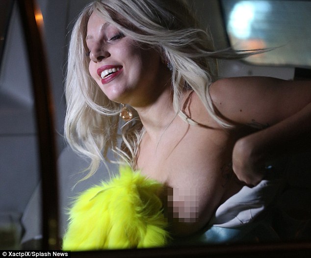 Lady Gaga exposes her boobs 11
